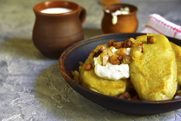Fried zeppelin (cepelinai) - tradishional lithuanian potato patt © lilechka75