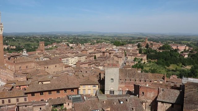 Looking to Torre del Mangia and Piazza del Campo in Siena, Tuscany Italy 