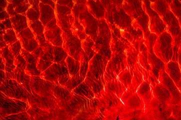 Fototapeta premium Water Shine in red.