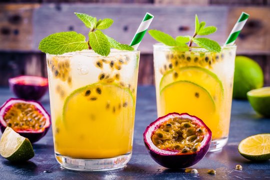 tropical cocktail with passion fruit, lime and mint