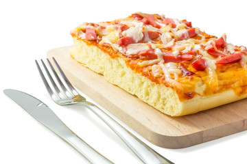 Homemade delicious fresh a slice of pizza on wooden plate.