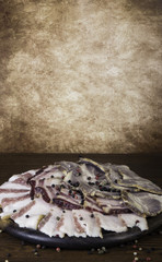 Wooden table with food. side view. Meat and bacon