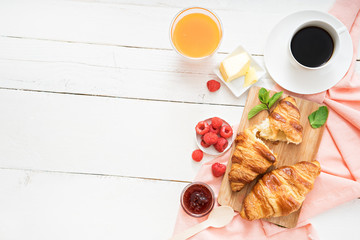 breakfast time with croissants and coffee on wooden table - obrazy, fototapety, plakaty