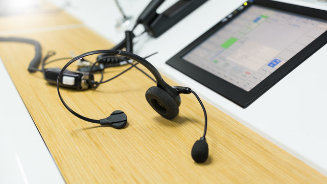 Headset with microphone , phone , lcd monitor - controller or call center concept