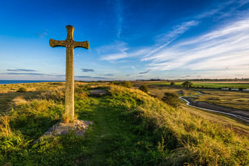 Fototapeta na wymiar St Cuthbert's Cross on the Northumberland coast, England