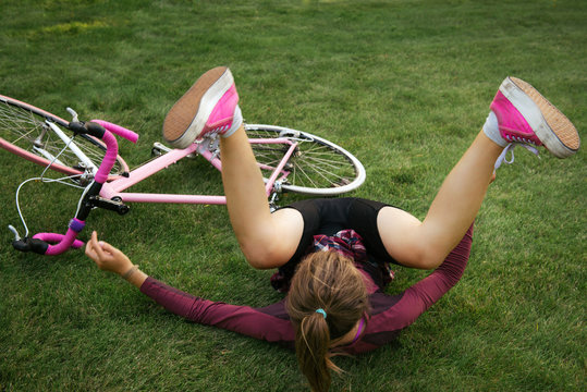 Woman Fall Down From The Bicycle