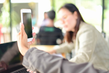 Young woman taking selfie on the coffe cafe