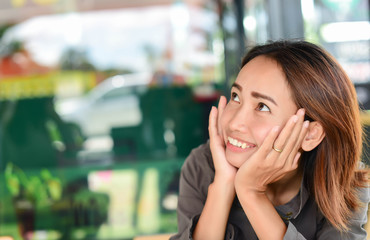 Woman worker of happy with cup of coffee