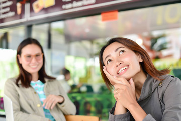 Woman worker of happy with cup of coffee