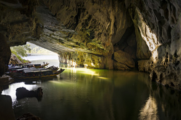 PHONG NHA/VIETNAM : JULY 16, The mouth of Phong Nha cave with underground river and taxi boats, July 16, 2016, Phong Nha National Park, Vietnam