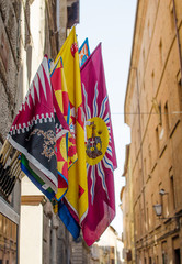 The flags of contrads of Siena. Palio.