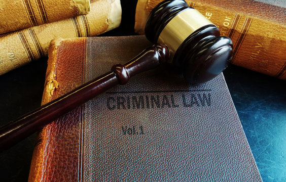 Gavel on old Criminal Law books