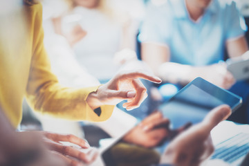 Closeup Young Business People Gathered Together Discussing Creative Idea.Startup Brainstorming Process.Coworker Making Great Decision.Dream Team Discussion Work Concept.Friends Using Tablet Hand.