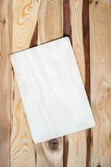 Blank wooden plate on the wooden boards