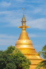 Fototapeta premium Myanmar pagoda golden color in temple at Myawaddy