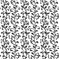 Seamless pattern with black floral tracery on a white background