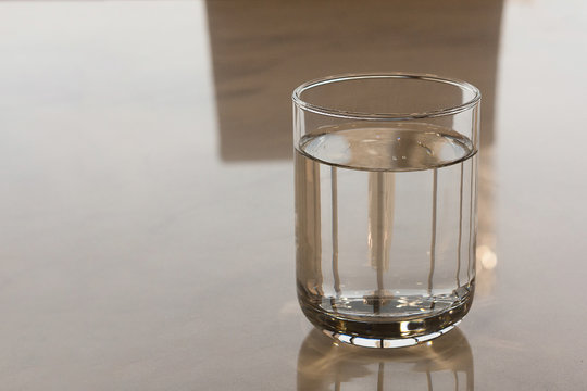 Glass Of Water / Glass Of Water On The Table In Office Worker.