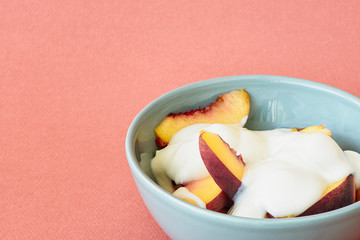 Peach with natural yogurt