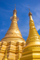 Fototapeta premium Myanmar pagoda golden color in temple at Myawaddy
