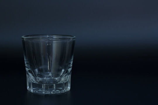 old fashion glass with gray background