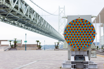 The Akashi Kaikyo Bridge with sample of wire rope construction in Kobe, Japan.