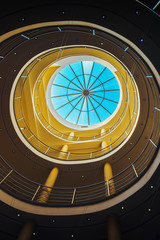 Modern architectural feature, round staircase and glass roof