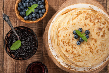 Crepes with blueberries and jam