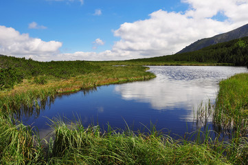 Fototapeta na wymiar Lake Trojrohe Pleso in the National Park High Tatra