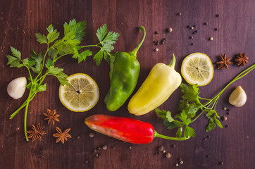 Obraz na płótnie Canvas ingridients for salad pepper, garlic, lemon and some spices. Top