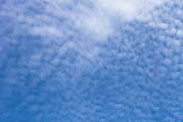 White clouds on a blue sky. Selective focus