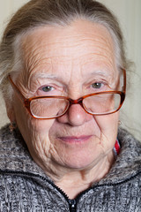 Portrait of elderly woman in glasses