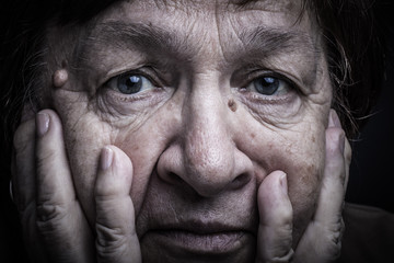 Portrait of elderly woman. Anxiety. Toned
