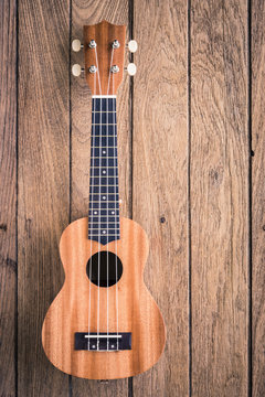 ukulele on old wodden background
