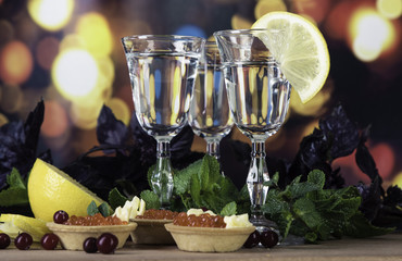 Alcohol set with bokeh background and food
