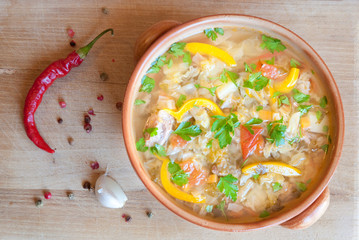 Vegetable soup on wooden table
