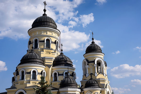 Photo of Capriana Monastery in Moldova with blue sky