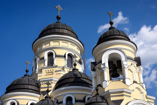 Photo of Capriana Monastery in Moldova with blue sky