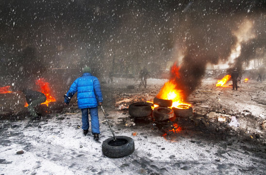 Protesters burn tires to protect from snipers