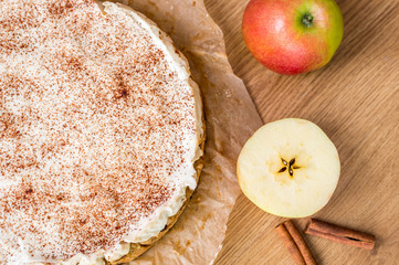 Home made apple and cinnamon pie with cottage cheese dusted with cocoa powder