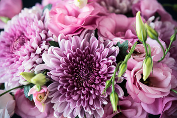 Bouquet of pink flowers closeup, eustoma and chrysanthemum - obrazy, fototapety, plakaty