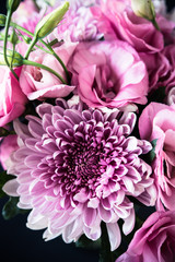 Bouquet of pink flowers closeup, eustoma and chrysanthemum