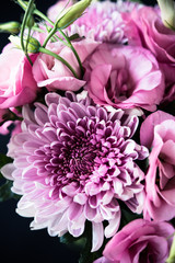 Bouquet of pink flowers closeup, eustoma and chrysanthemum