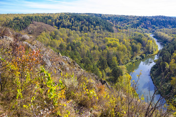 Fototapeta na wymiar Autumn landscape. View of the Siberian river Berd, from the rock