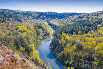 Naklejka premium Autumn landscape. View of the Siberian river Berd, from the rock
