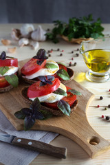 Caprese salad on bread slices