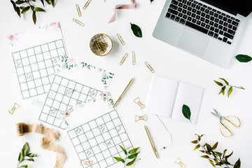 wedding planner schedule calendar painted with watercolor, laptop, notebook and accessories. flat lay workspace, top view
