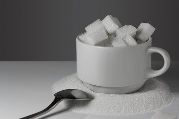 A cup with lump sugar