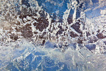 Frozen frost background, transparent blue ice texture