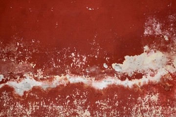 Fototapeta premium Red pavement wall texture with different tones of red and white