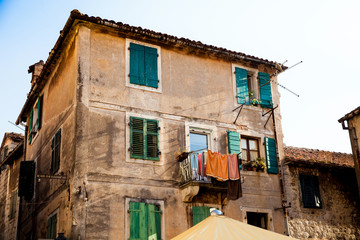 Old building in Kotor city in Montenegro. Clothes drying on the balcony